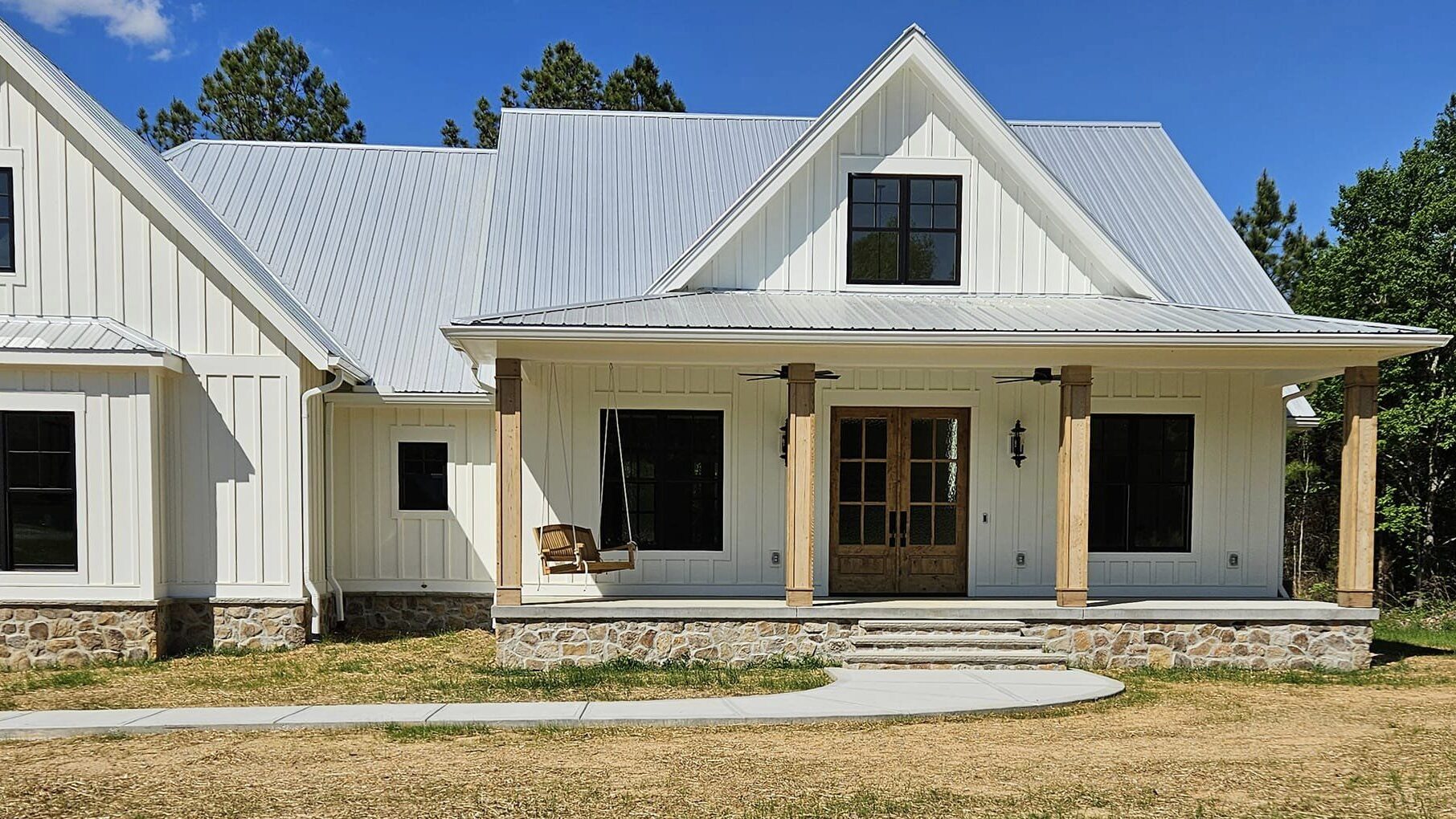 seamless gutter installation on the front of a house